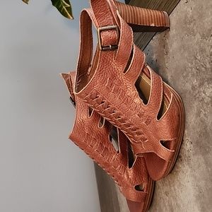 Women's tan/brown heel.  Nice leather detail. Size 7